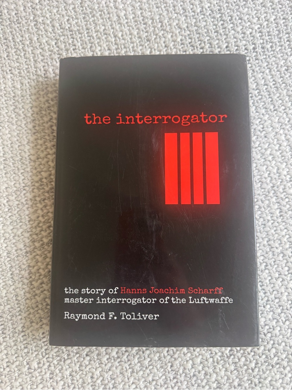 The Interrogator by Raymond F. Toliver - Black & Red Hardcover